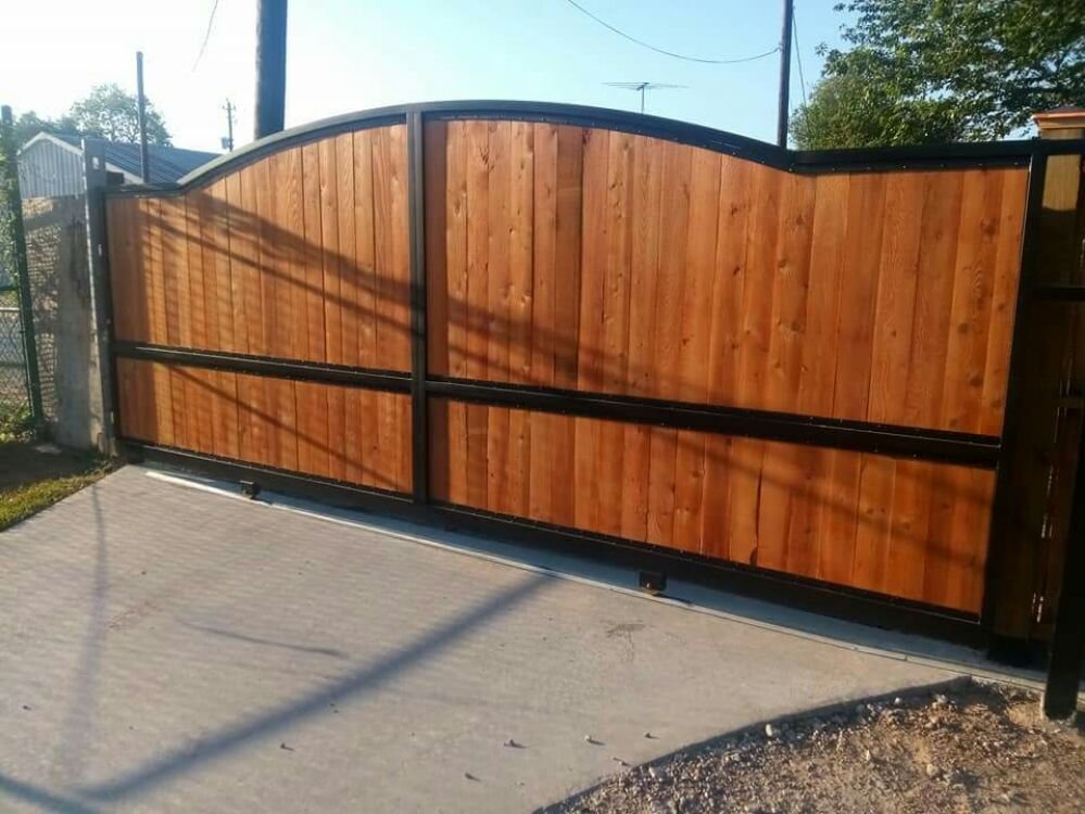 Maxim Garage Door technician performing Gate Repair and Installation in Dallas