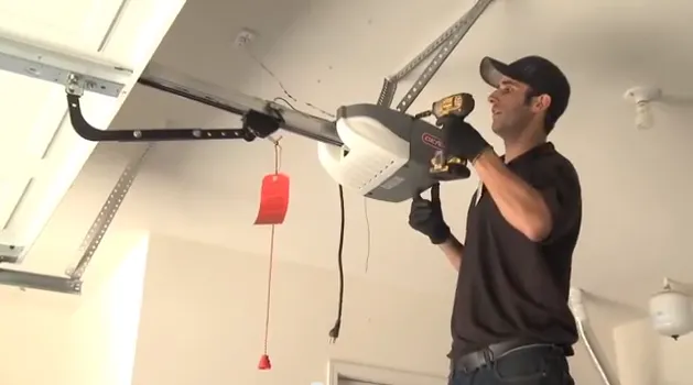 Maxim Garage Door technician performing Garage Door Opener Repair in Dallas