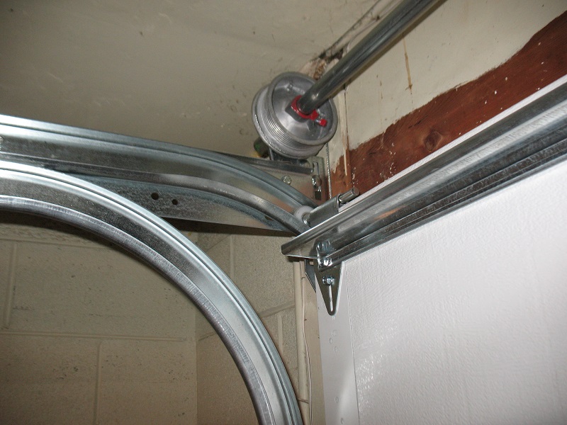 Maxim Garage Door technician performing Garage Door Tracks Bent in Dallas